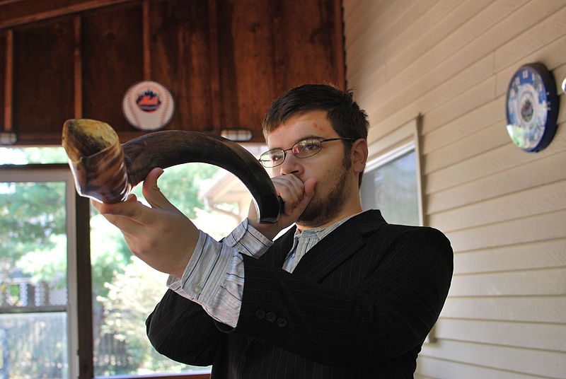 Blowing a shofar